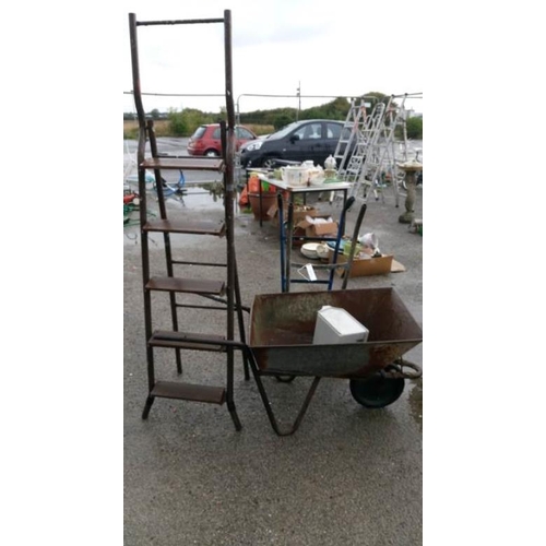 40A - A wheelbarrow & step ladder