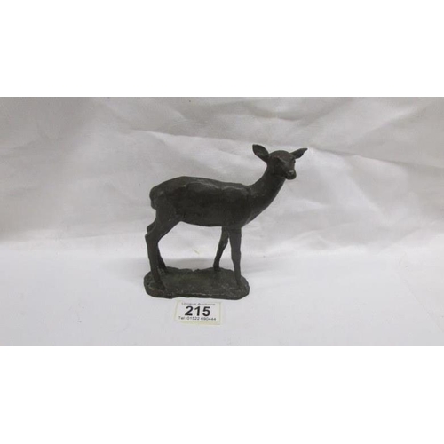 215 - A bronze hand worked deer, 15cm high