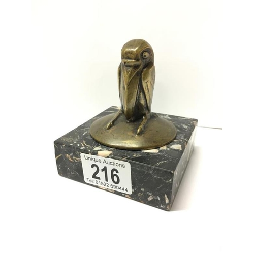 216 - An unusual bronze of a bird on a marble base, 11cm high including base