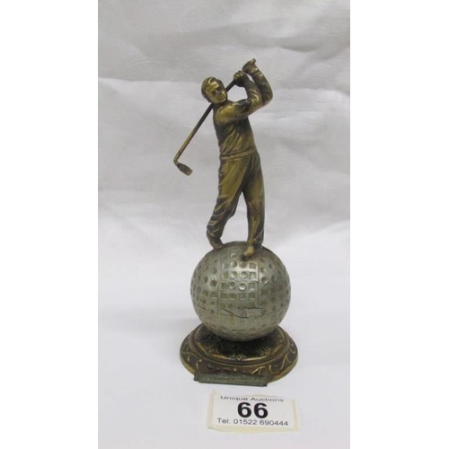 66 - An art deco spelter Lorenzl style striker lighter in the form of a golfer (missing wand)