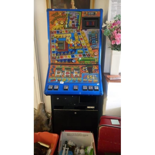 813 - A Simpson's arcade machine (works intermitantly)