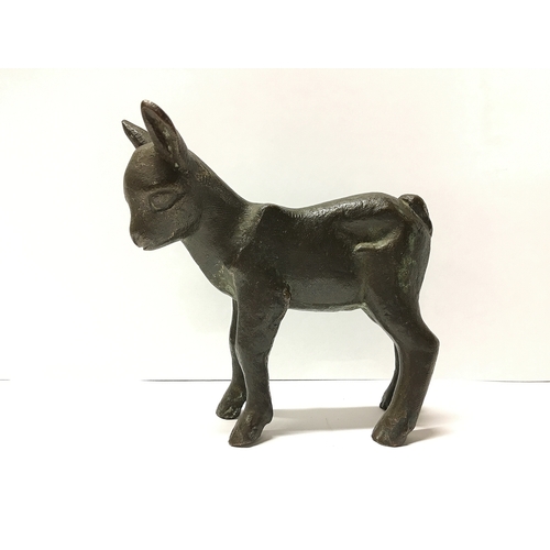 214 - A bronze lamb signed F.K.