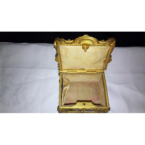 108 - A small ormolu mounted casket marked 'Tahan A Paris'