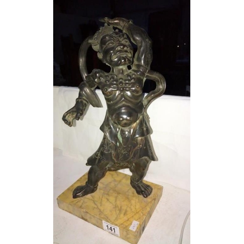 141 - A bronze oriental warrior