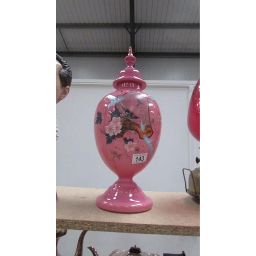 143 - A 19th century pink hand painted glass lidded vase