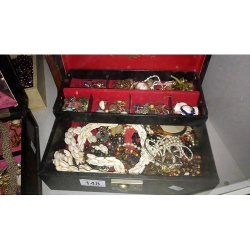 148 - A jewellery box containing assorted costume jewellery