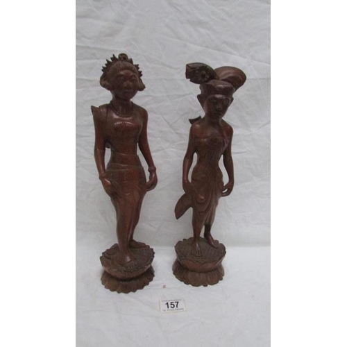 157 - 2 carved wood oriental figures