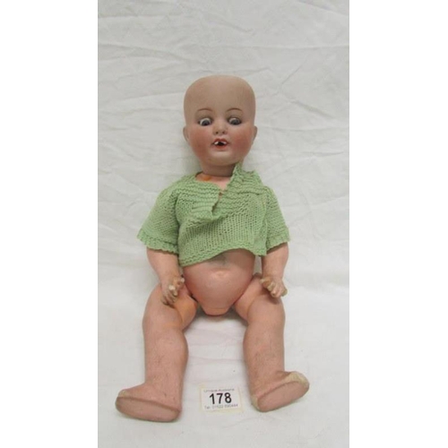 178 - A 19th century bisque headed doll with composition body marked A M Koppelsdorf, Germany, 990, A7M, a... 