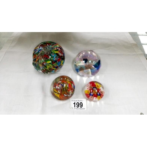 199 - 10 glass paperweights