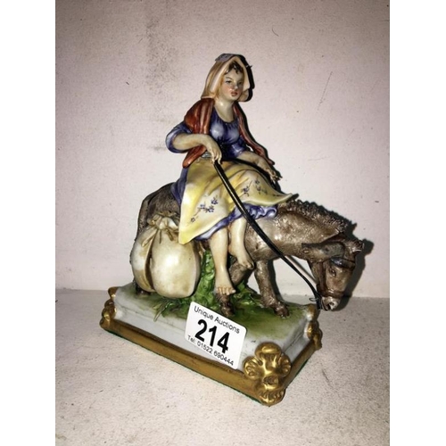 214 - An old Capodimonte lady on donkey