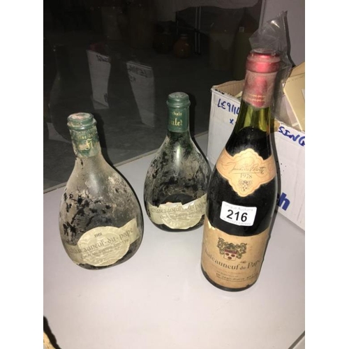 216 - 3 Old bottles of wine