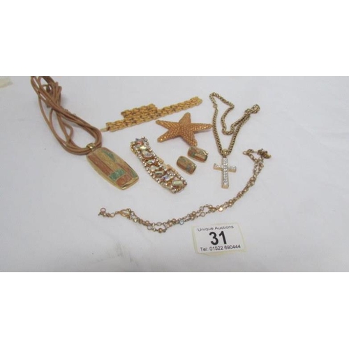 31 - A mixed lot of jewellery including pendant with matching earrings, necklace, bracelets etc