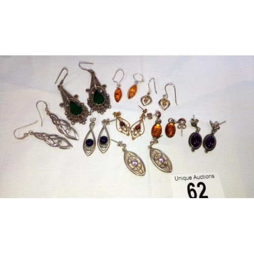 62 - 9 pairs of silver earrings