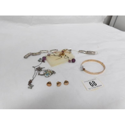 68 - A box of jewellery including gold brooches, enamel pendant, earrings etc