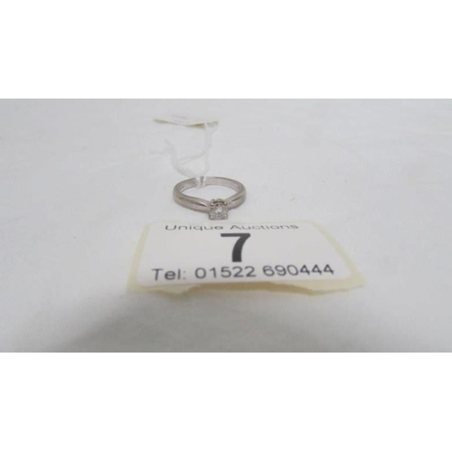 7 - A single stone diamond ring set in 18ct white gold, ring size O, 4.91g.