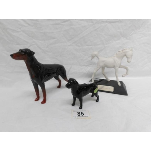 85 - A Beswick horse and 2 dogs