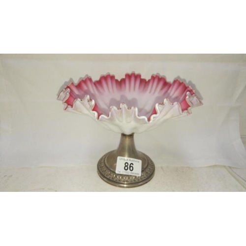 86 - A satin glass sweetmeat dish on metal base