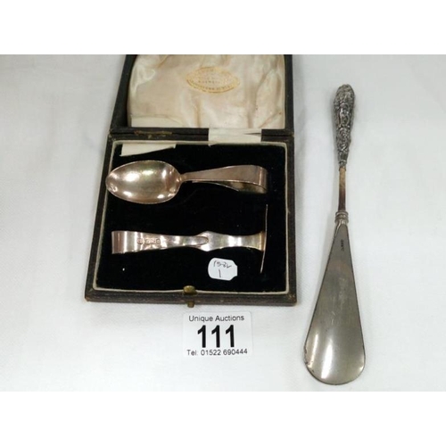 111 - A HM silver feeding set and shoe horn