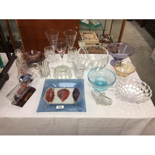 141 - A quantity of mixed glassware including carnival glass, ships in bottles etc.