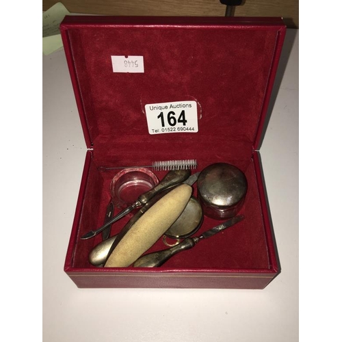 164 - A box of manicure items