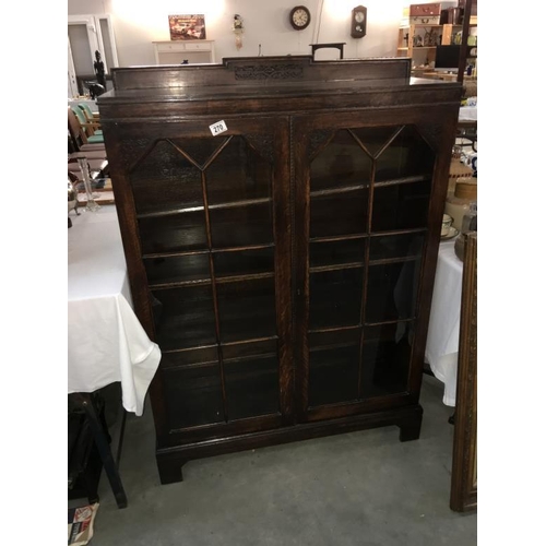 270 - A oak glazed book shelf