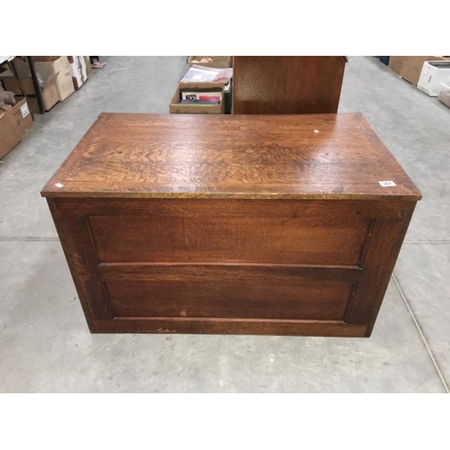 307 - An old oak box with inlaid side