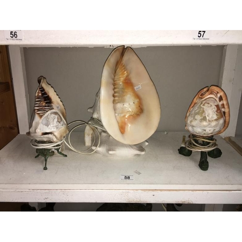 58 - 2 carved cameo shell lamps & conch shell lamp