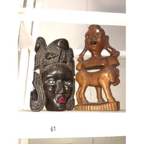 61 - A carved African mask & carved bust