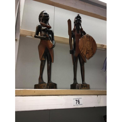 76 - A pair of carved African figures