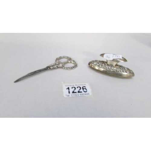 1226 - A pair of HM silver scissors and nail buffer