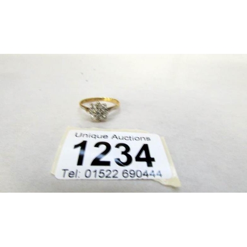 1234 - An 18ct gold floral 55pr diamond ring, size Y