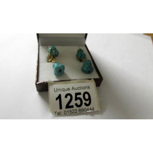 1259 - A pair of retro turquoise stone ear pendants, post-in clip 14ct gold, stamped 585