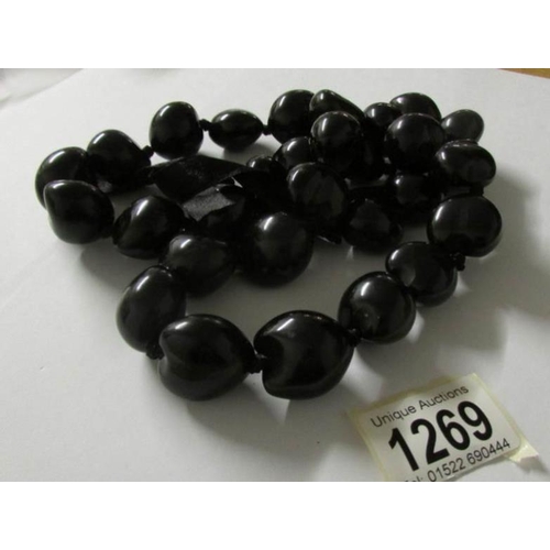 1269 - A large string of black beads