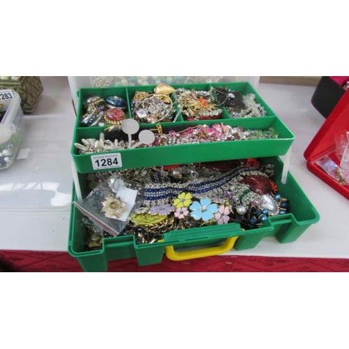 1284 - A large box of assorted costume jewellery