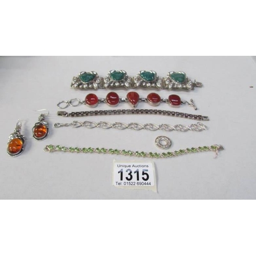 1315 - 6 items of silver jewellery including bracelet with Mexican face depictions, amber set in silver ear... 