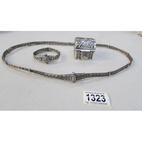 1323 - A white metal necklace with matching bracelet (possibly Persian) and a white metal ring box with key