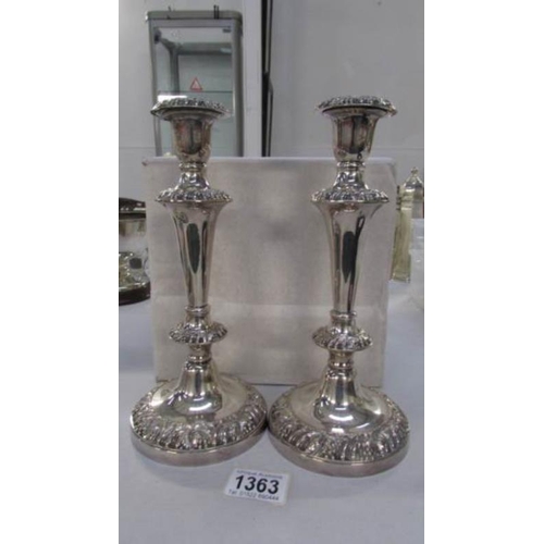 1363 - A pair of ornate silver plate candlesticks