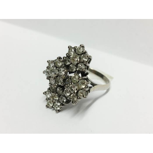 1215 - An 18ct 4 petal 1.5 carat plus Art deco white gold diamond ring, size X