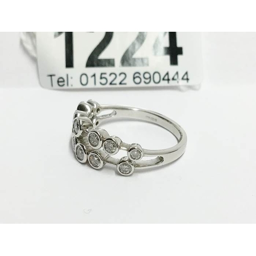 1224 - An 18ct white gold 2 bar ring of spaced diamonds