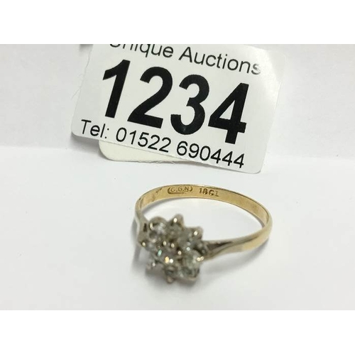 1234 - An 18ct gold floral 55pr diamond ring, size Y