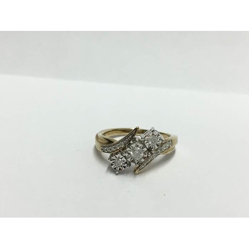 1235 - A yellow gold floral diamond crossover ring, size S