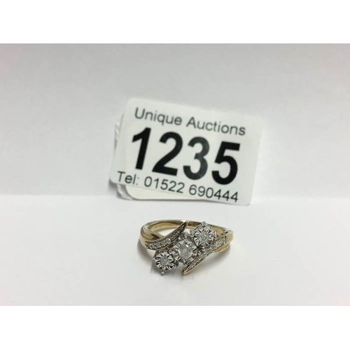 1235 - A yellow gold floral diamond crossover ring, size S