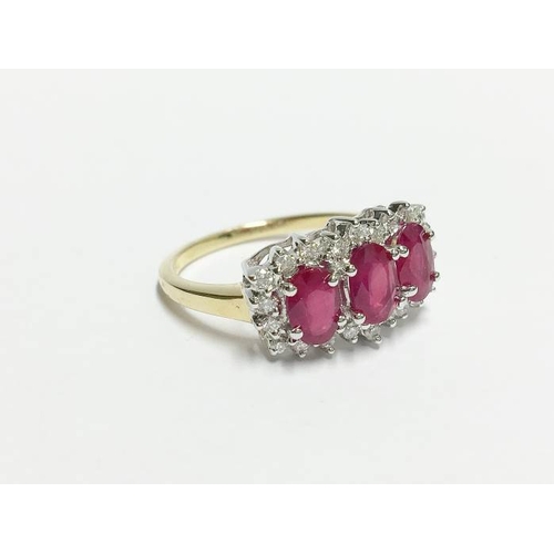 1244 - An 18ct yellow gold ring set ruby and diamonds, size T