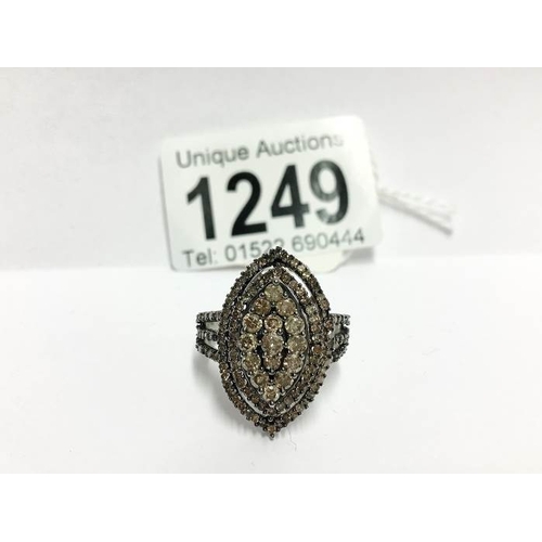 1249 - A Marquis shaped yellow gold diamond ring, size T