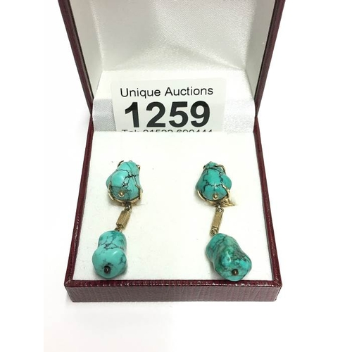 1259 - A pair of retro turquoise stone ear pendants, post-in clip 14ct gold, stamped 585