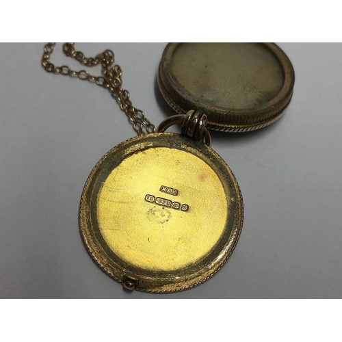 1266 - An antique 15ct gold opening photograph locket with a blood stone setting to front on a 9ct gold cha... 