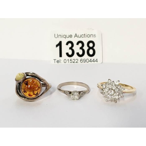 1338 - A yellow metal cluster ring and 2 others