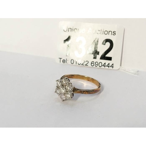 1342 - A ladies 18ct yellow and white gold 7 stone diamond cluster ring (total diamond weight 1.00 carat)