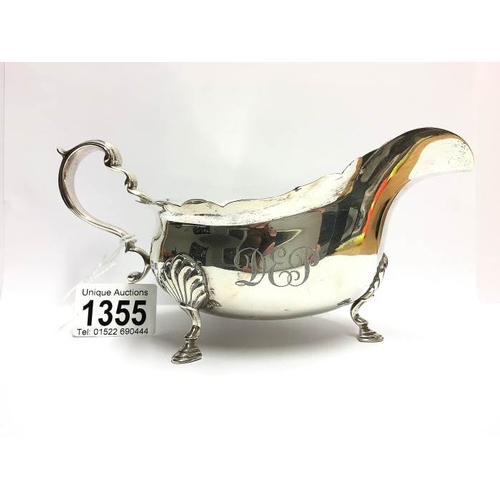 1355 - A silver sauceboat by Mappin & Webb, HM Birmingham 1923, 279gms