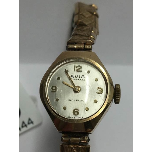 1373 - A 9ct gold ladies wrist watch on a yellow metal bracelet